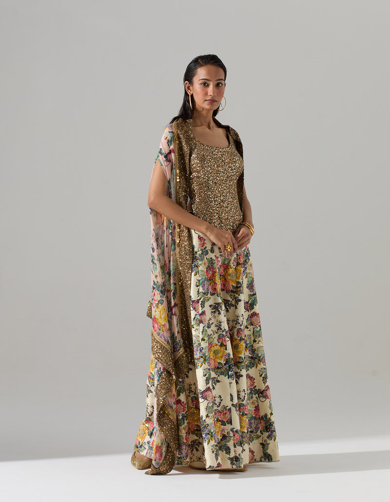 Ivory Printed Sharara Set with a Sequined Top and a Cape