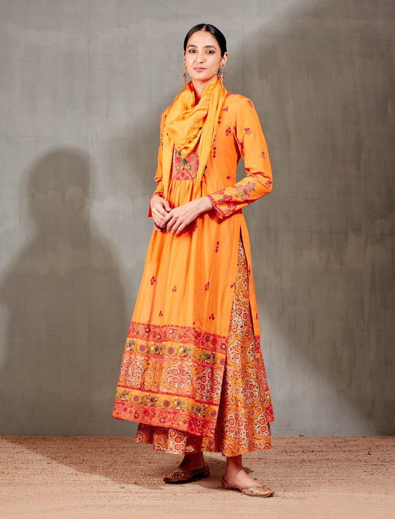 Orange Kurta with a Fershi and Scarf