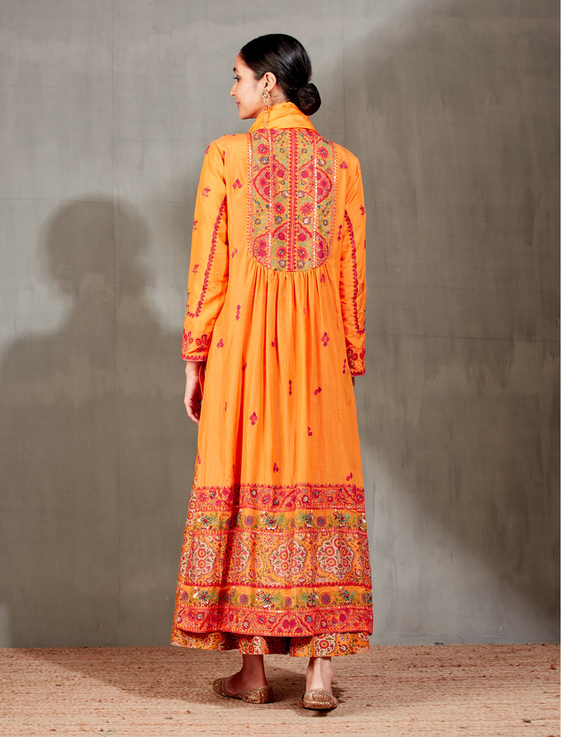 Orange Kurta with a Fershi and Scarf
