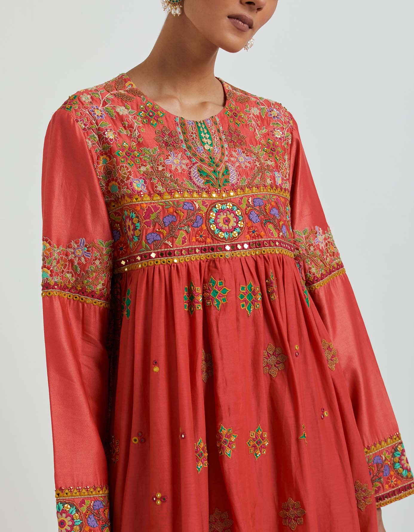 Coral Peplum With a Sharara Set Debyani Coral Peplum With a Sharara Set Debyani